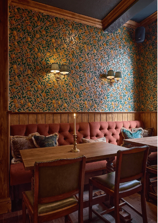 Lincrusta x Morris & Co. handpainted Fruit wallcovering in pub setting